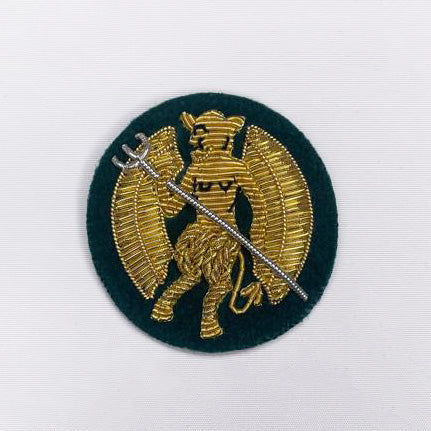 Inns of Court & City Yeomanry Beret Badge on green cloth (8116376994051)